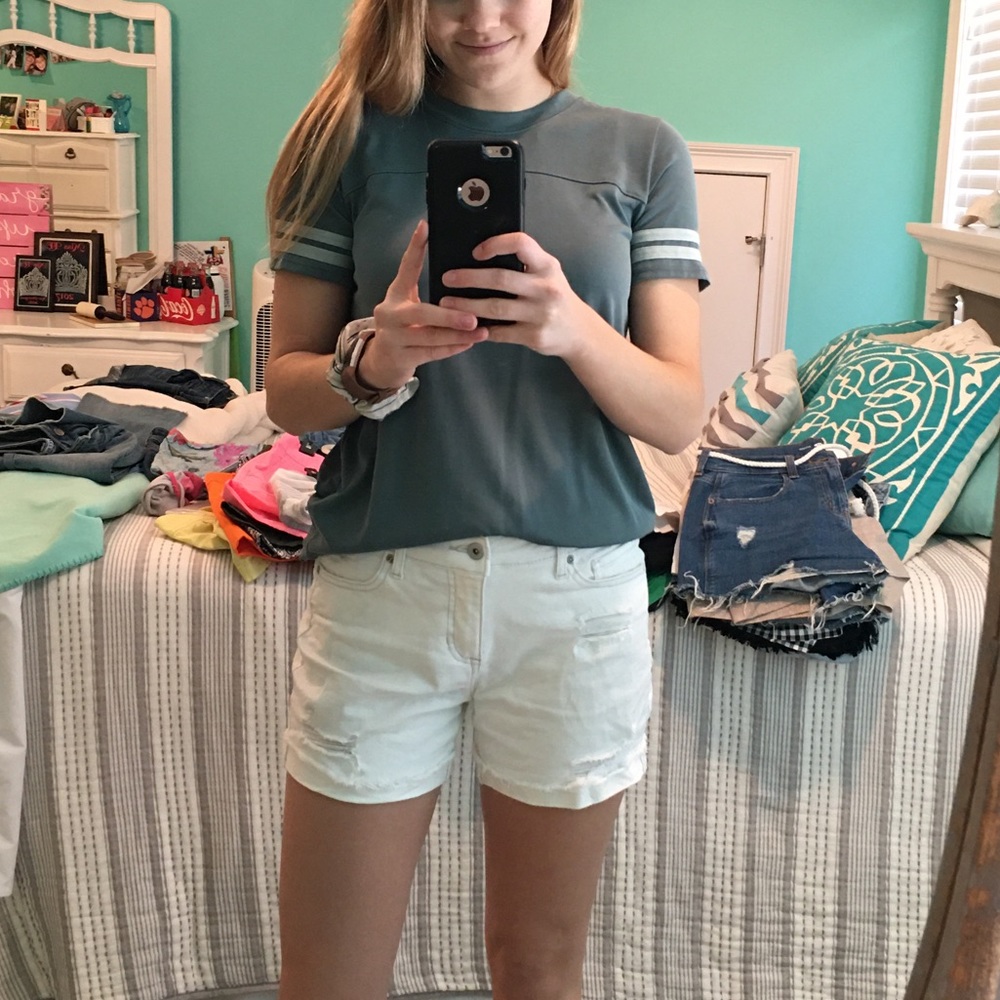 Ripped white jean shorts